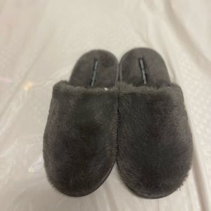 Grey cozy slippers for home or for on the go in a size medium